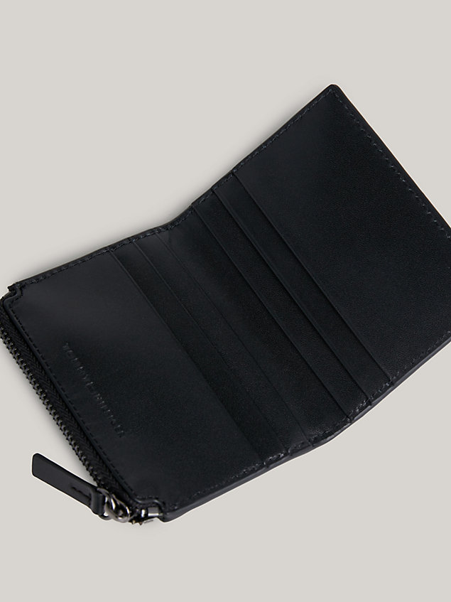 black th monogram embossed leather bifold wallet for men tommy hilfiger