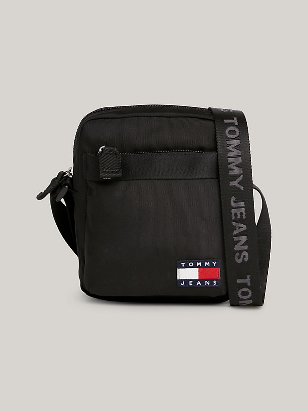 black essential repeat logo reporter bag for men tommy jeans