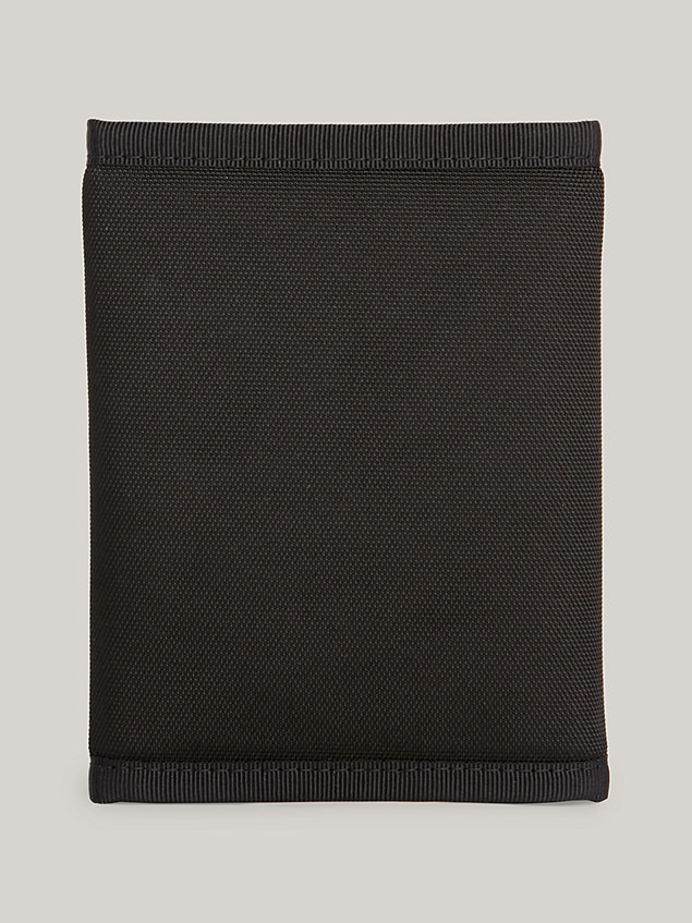 black essential badge trifold wallet for men tommy jeans