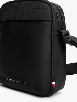 borsa reporter con logo in metallo nero da uomini tommy hilfiger