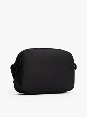 petit sac bandoulière à logo en métal noir pour hommes tommy hilfiger