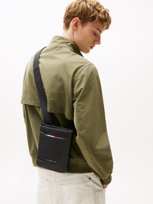 black metal logo pebble grain crossbody bag for men tommy hilfiger