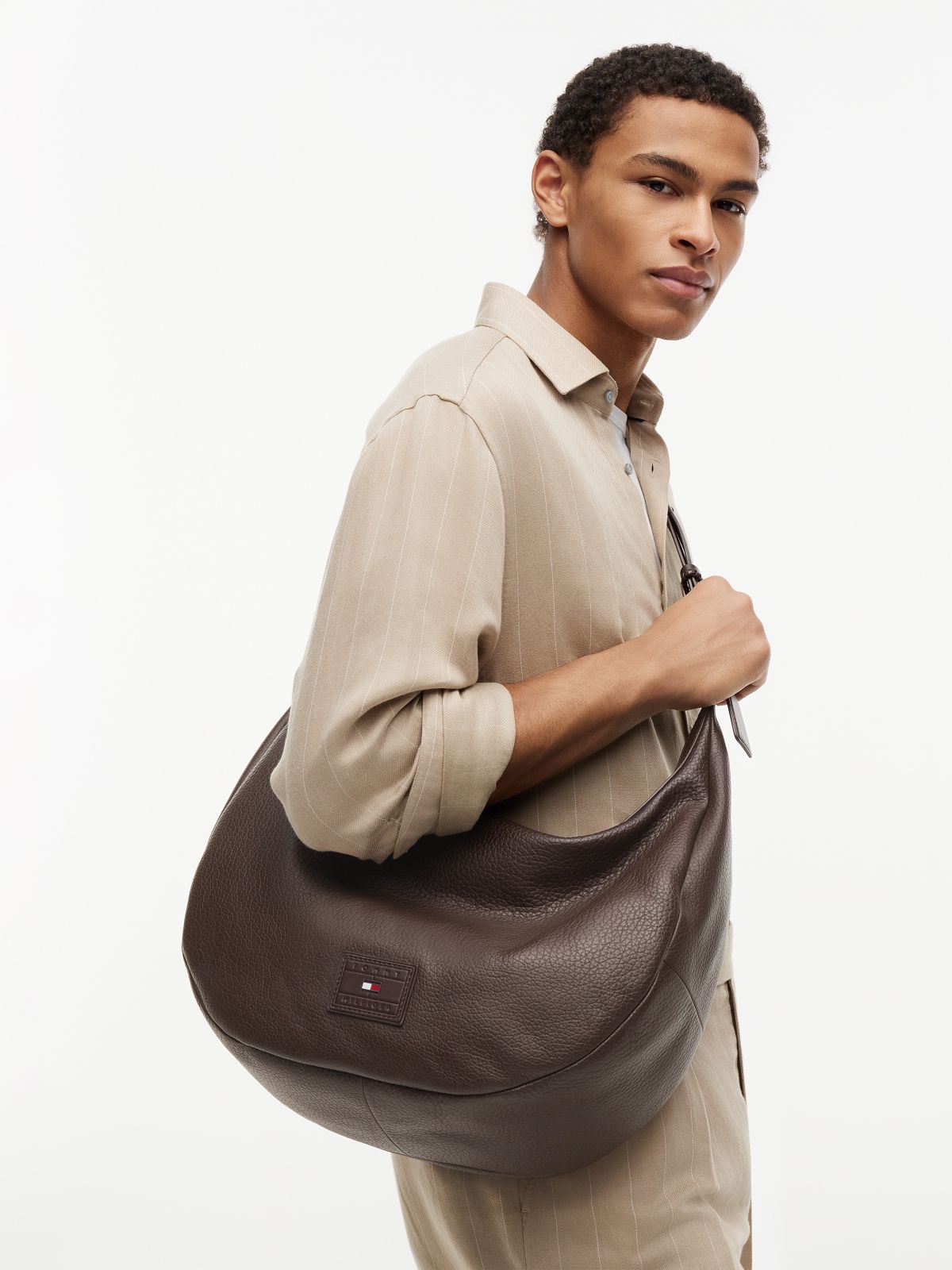 Logo Patch Slouch Leather Crossbody Bag — Brown
