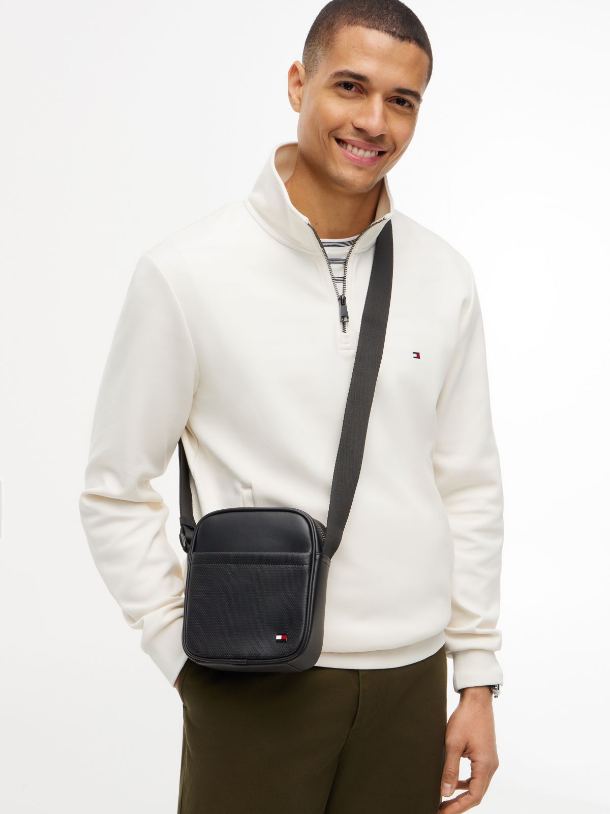Enamel Flag Perforated Crossbody Reporter Bag — Black