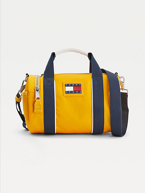 yellow tommy badge recycled nylon barrel bag for women tommy jeans
