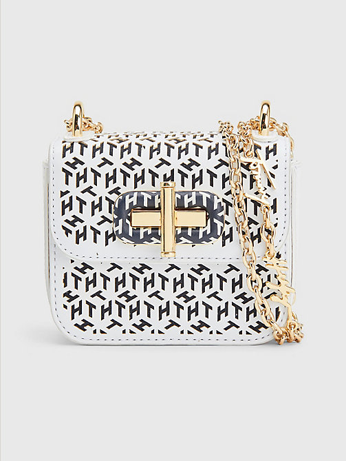 white turn lock laser cut micro bag for women tommy hilfiger