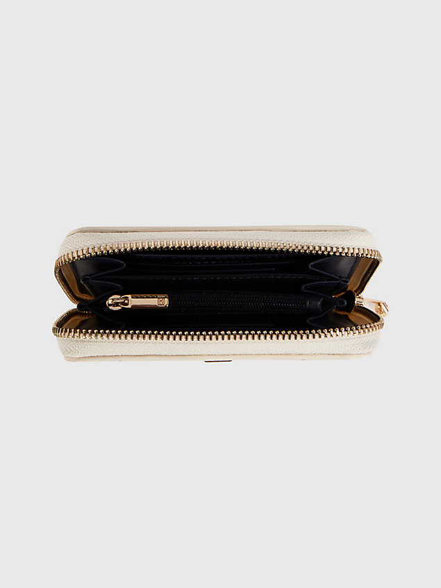 beige signature monogram medium zip-around wallet for women tommy hilfiger