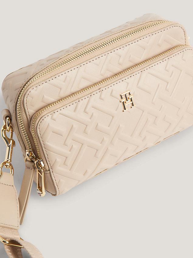beige iconic embossed th monogram crossover camera bag for women tommy hilfiger