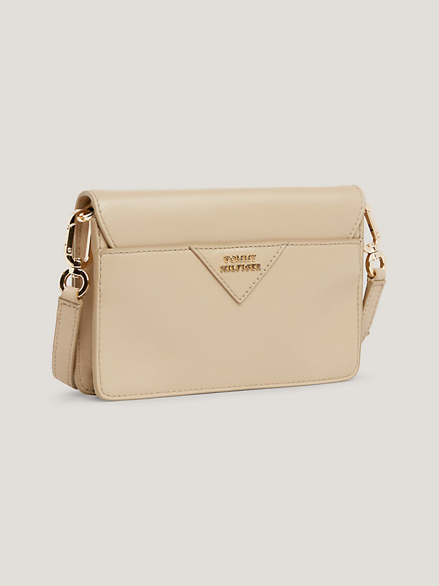 beige small leather push lock crossover bag for women tommy hilfiger