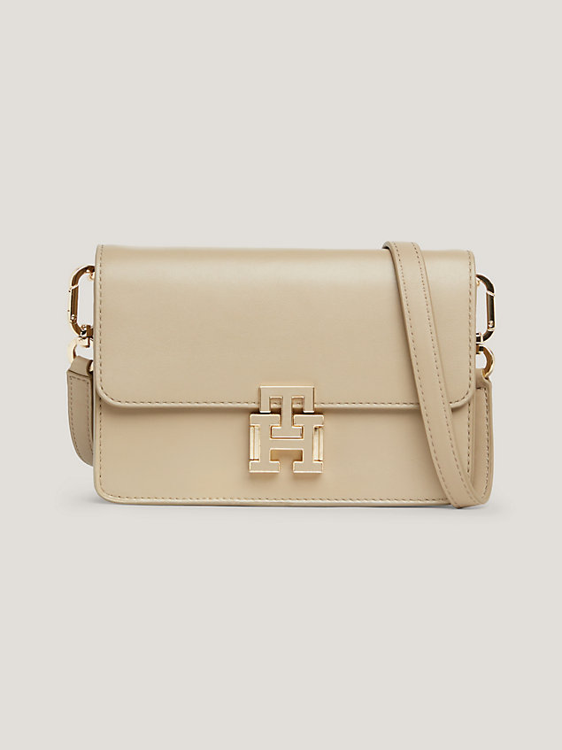 beige small leather push lock crossover bag for women tommy hilfiger