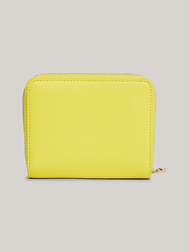 yellow iconic medium th monogram zip-around wallet for women tommy hilfiger