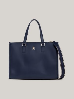 Brown Thomas - Make It Yours. Receive a beautiful monogram plague make-up  bag when you spend over €55 on Tommy Hilfiger women's underwear or swimwear  in store and online. 👉