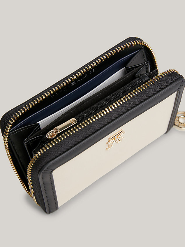 beige essential th monogram medium zip-around wallet for women tommy hilfiger