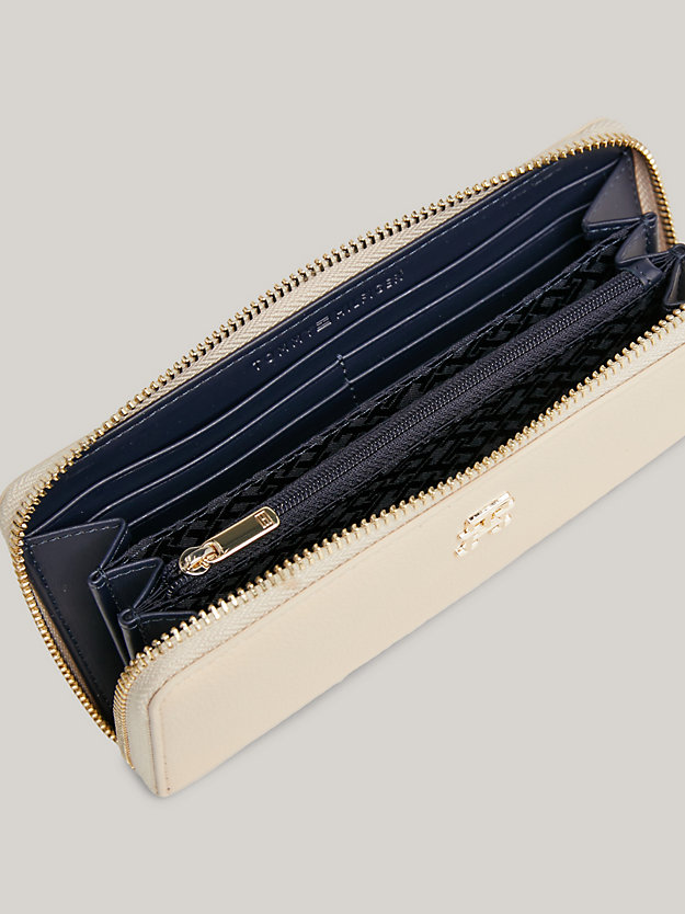 beige essential th monogram large zip-around wallet for women tommy hilfiger
