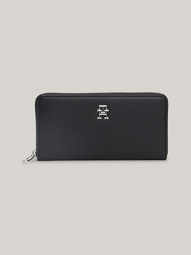 black essential th monogram large zip-around wallet for women tommy hilfiger