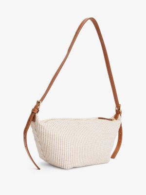 beige canvas sling bag for women tommy hilfiger