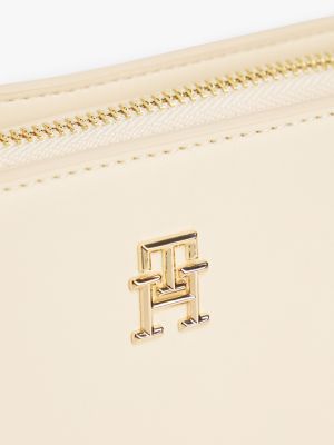 petit sac bandoulière à monotype hilfiger beige pour femmes tommy hilfiger