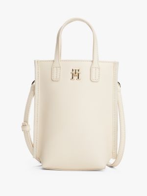 wit telefoontasje met crossbodyband en monogram voor dames - tommy hilfiger