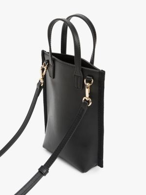 zwart telefoontasje met crossbodyband en monogram voor dames - tommy hilfiger