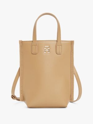 beige crossbody-handytasche mit th-monogramm für damen - tommy hilfiger