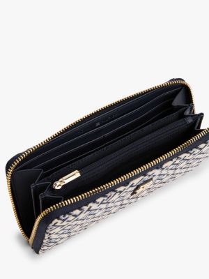 blue th monogram jacquard zip-around wallet for women tommy hilfiger