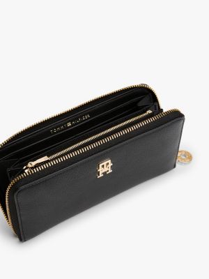 black th monogram plaque zip-around wallet for women tommy hilfiger