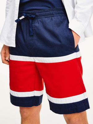 gym shorts under jeans
