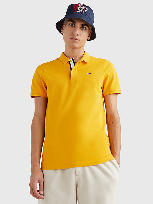 żółty wąska koszulka essential w stylu polo dla mężczyźni - tommy jeans