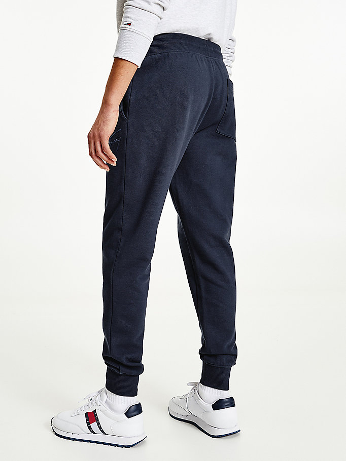 blauw fleece slim jogger met signature-logo voor heren - tommy jeans