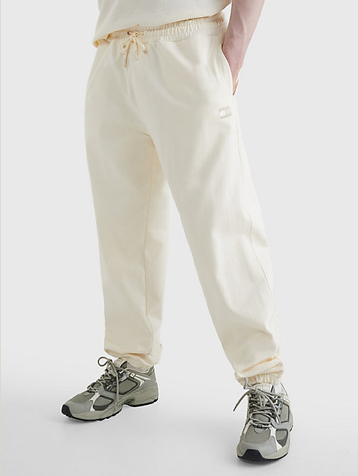 joggers de corte amplio con logo tonal blanco de mujer tommy jeans