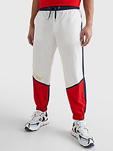 white colour-blocked joggers for men tommy jeans