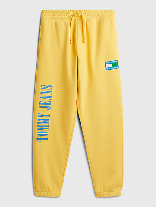 yellow exclusive pop drop joggers for men tommy jeans