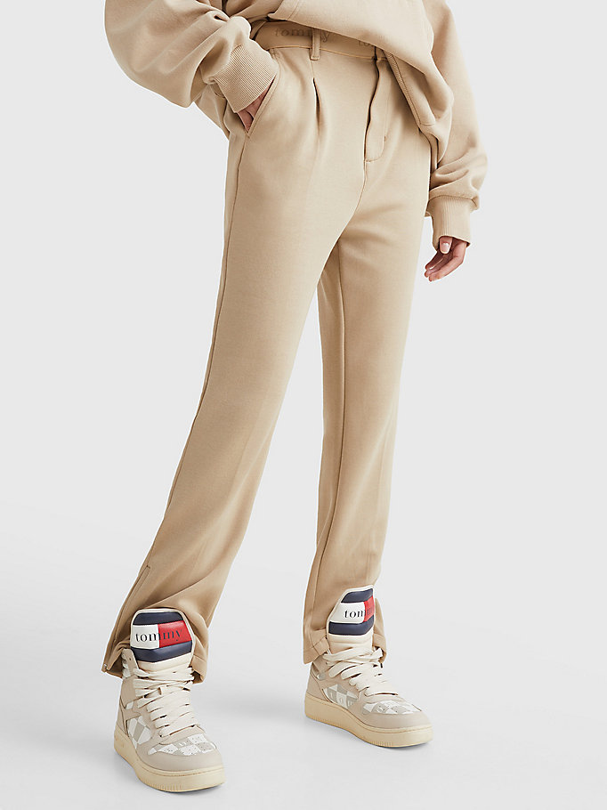 beige zip cuff dual gender bootcut trousers for men tommy jeans