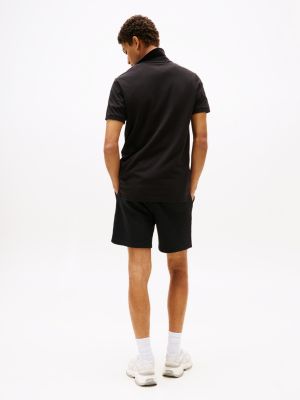 polo ajusté en pur coton noir pour hommes tommy jeans