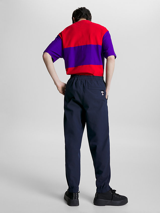 blue letterman wind-pant trousers for men tommy jeans
