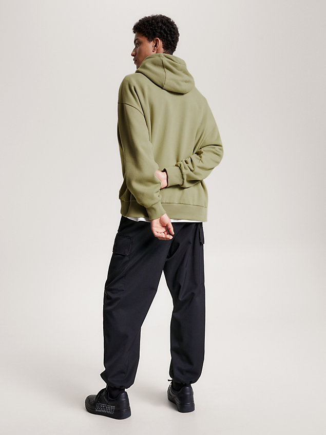 green essential garment wash hoody for men tommy jeans