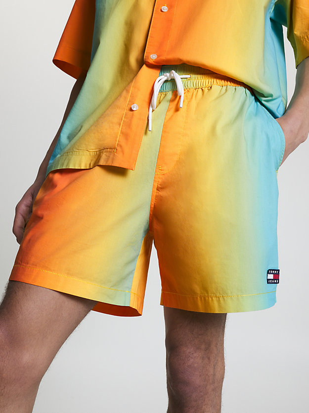 orange tommy jeans x festival genderneutrale shorts mit tunnelzug und print für herren - tommy jeans
