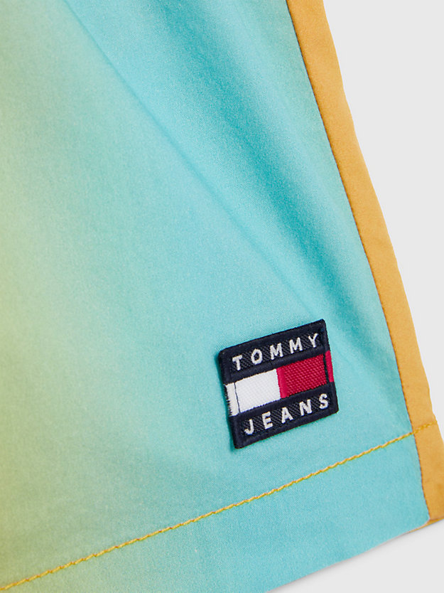 orange tommy jeans x festival genderneutrale shorts mit tunnelzug und print für herren - tommy jeans