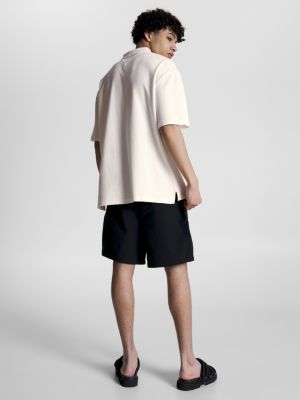 weiß tommy jeans x festival genderneutrales oversized fit jersey-poloshirt für herren - tommy jeans