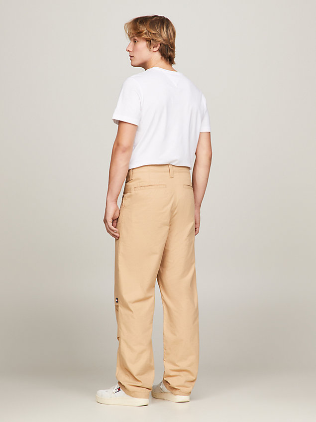 pantaloni chino aiden baggy fit beige da uomo tommy jeans