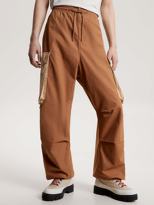 brown cargo parachute trousers for men tommy jeans