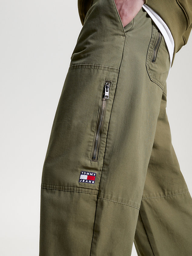 green aiden baggy fit tapered trousers for men tommy jeans