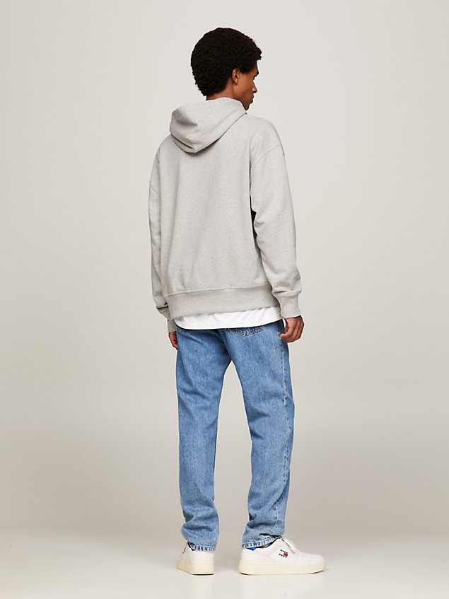 grey relaxed fit hoodie met signature-logo voor heren - tommy jeans