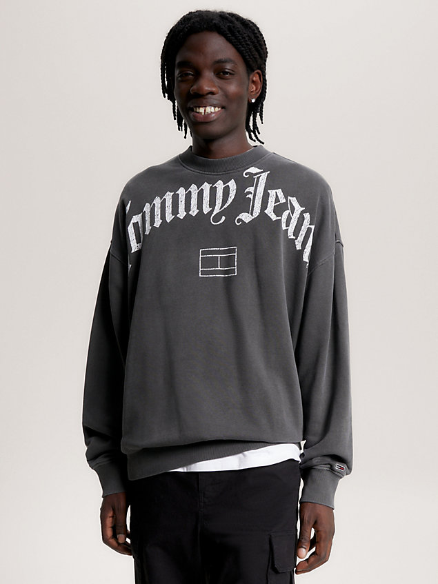 black relaxed fit sweatshirt met logo voor heren - tommy jeans
