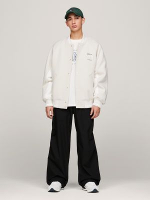beige varsity-bomberjacke mit logo für herren - tommy jeans