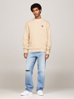 beige tommy badge crew neck sweatshirt for men tommy jeans