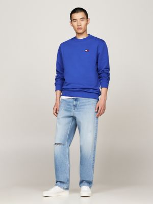 blue tommy badge crew neck sweatshirt for men tommy jeans