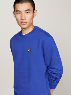 blue tommy badge crew neck sweatshirt for men tommy jeans