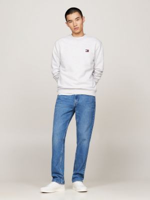 grey tommy badge crew neck sweatshirt for men tommy jeans