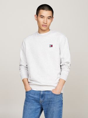 grey tommy badge crew neck sweatshirt for men tommy jeans